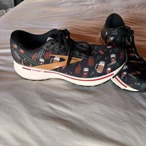 Brooks Black and Orange Athletic Shoes with Vibrant Design